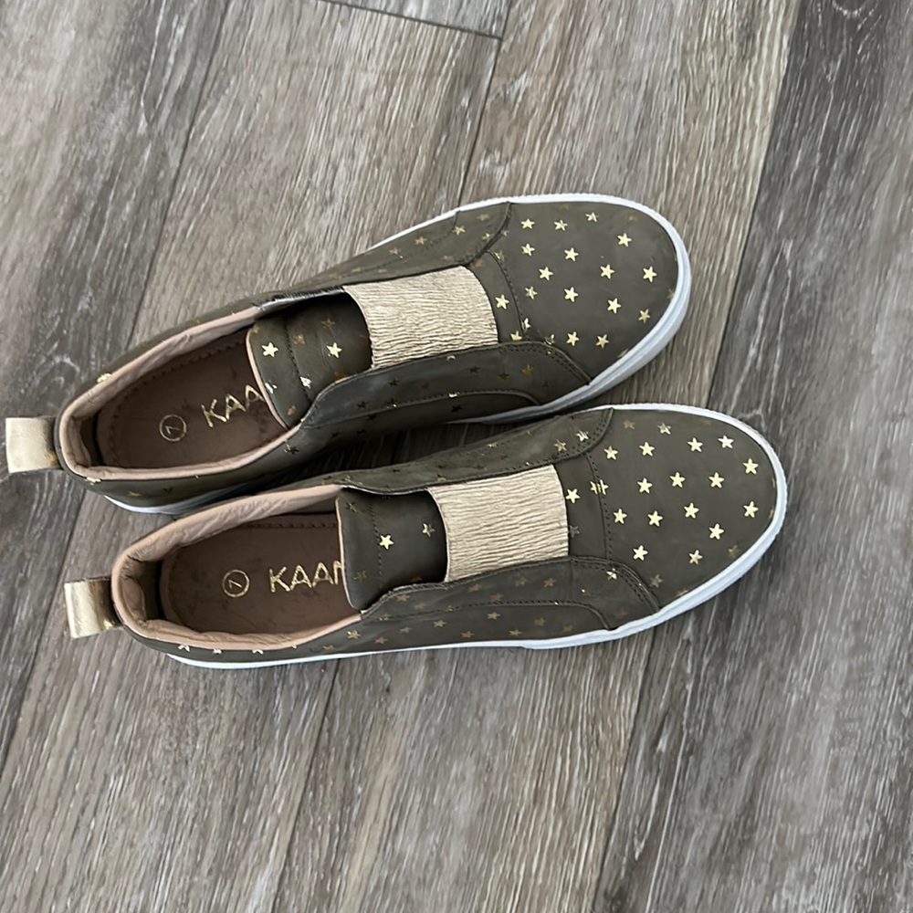 Size 7. Slip on. Army green with gold stars